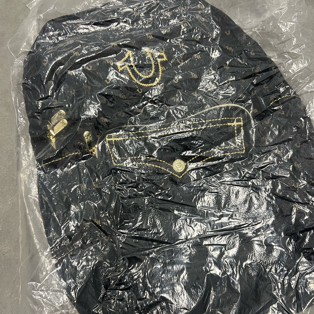 Black true religion Jeans backpack with Gold Stitching